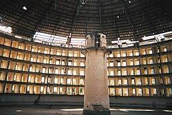 A picture of an abandone prison built like a panopticon